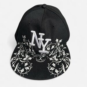 NY black flat cap with white embroidered design